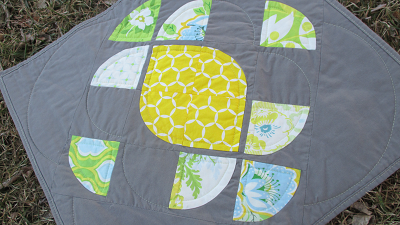 Mini-quilt made with curved piecing.